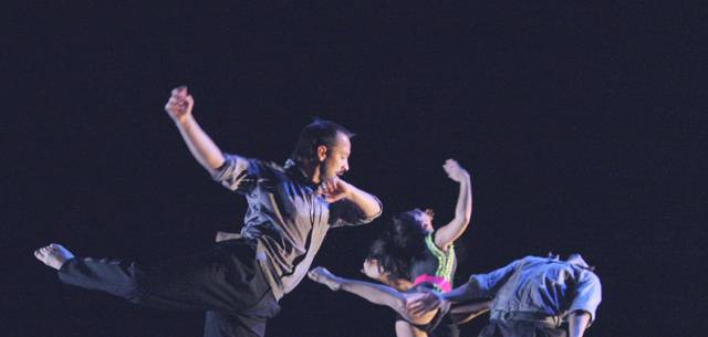 two dances fling their arms back while in an attitude