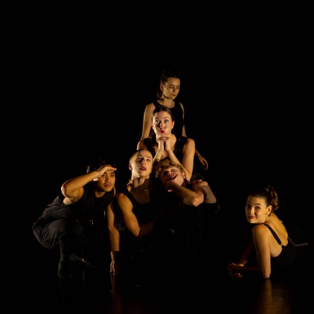 5 people pose making a variety of extreme facial expressions