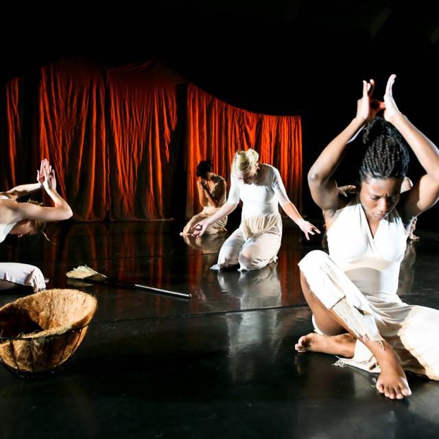 several women in meditative positions