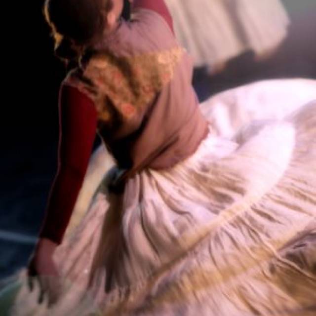 a fair skinned woman tosses her skirt