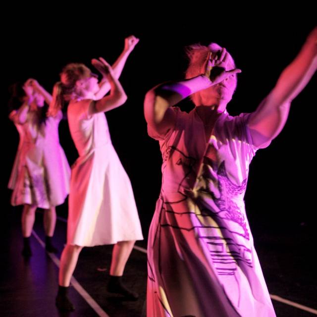 three women with one hand to their eye with the other hand outstretched