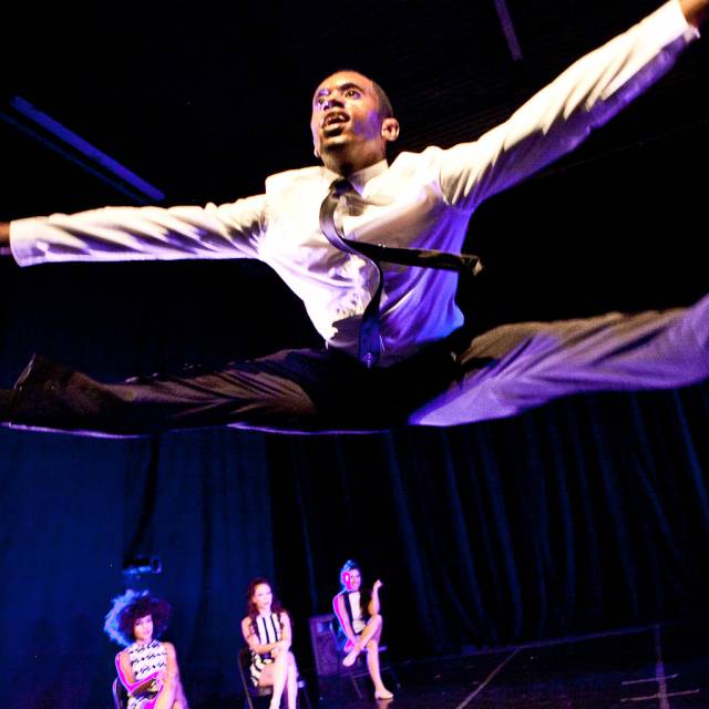 a man doing a leap in second