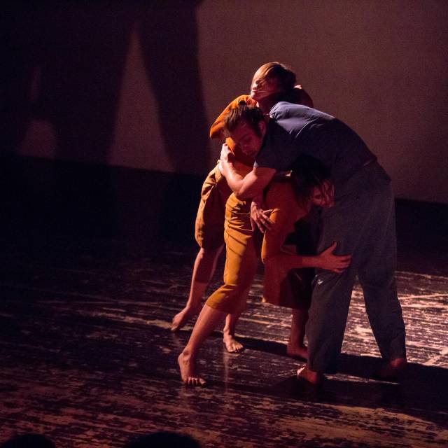 three people intertwined